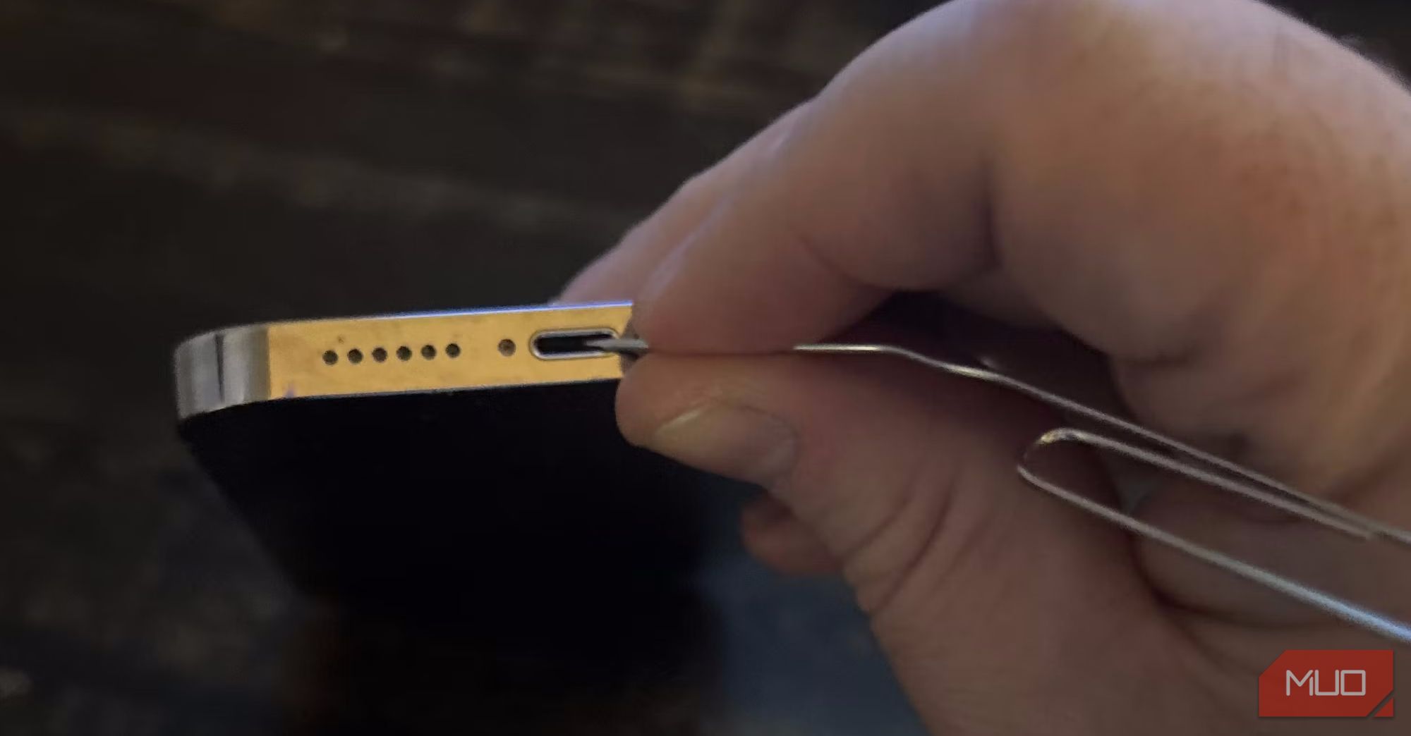 cleaning the Lightning port of an iPhone